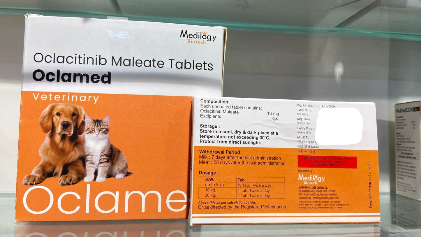 Oclacitinib Maleate Tablets packaging for veterinary use on a glass surface